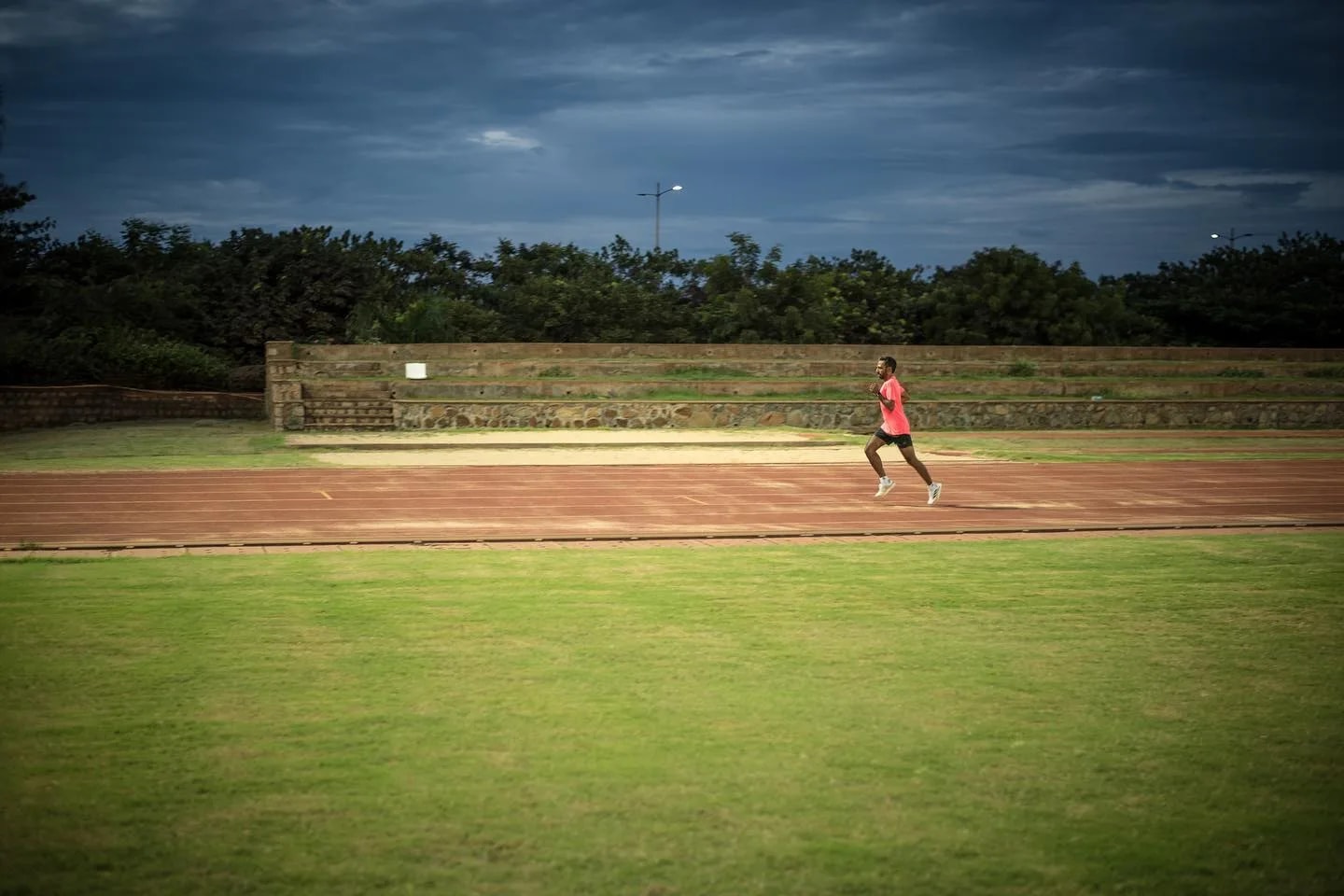 Coach Vikas Srinivasan running on track
