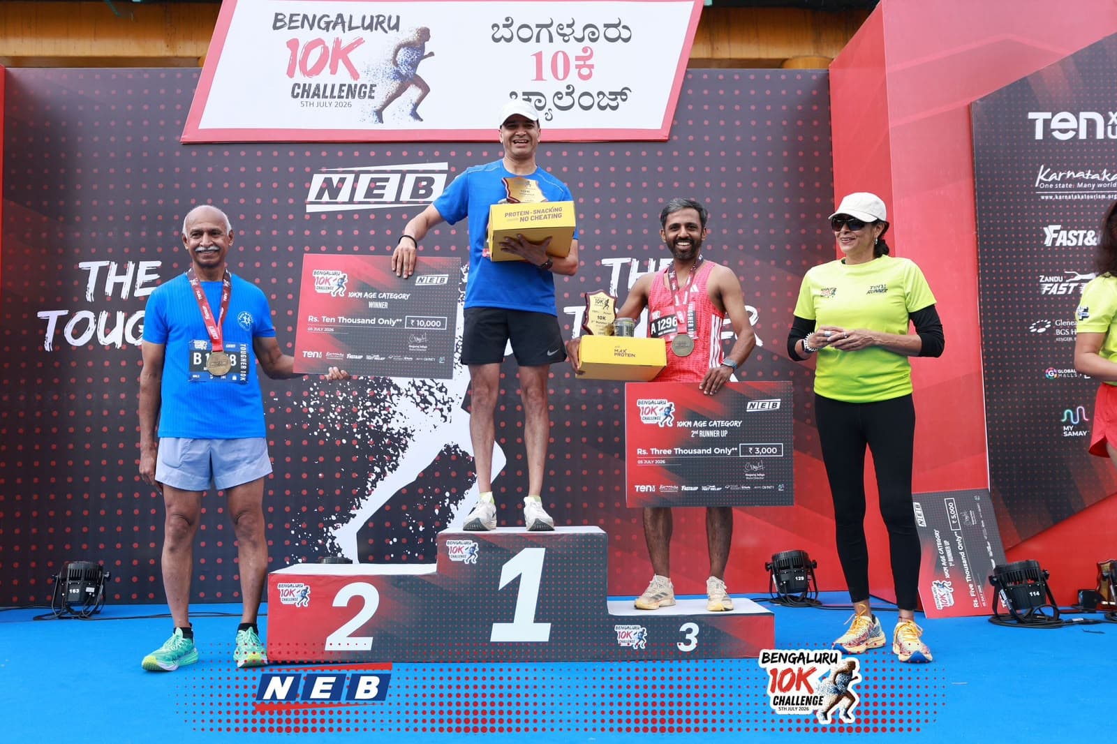 Coach Vikas Srinivasan on the podium as 2nd Runner Up in the 10K Age Category at the Bengaluru 10K Challenge 2026